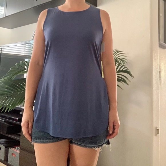 27. Blue top with fun design on the back - Picture 8 of 11